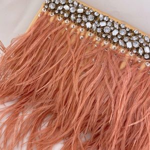 Feather rhinestone peach clutch